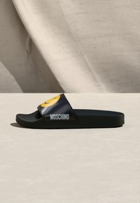 MOSCHINO SMILE - Mules - black/yellow