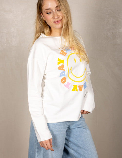 White sweater with smiley face and “Today I Have a Good Day” print