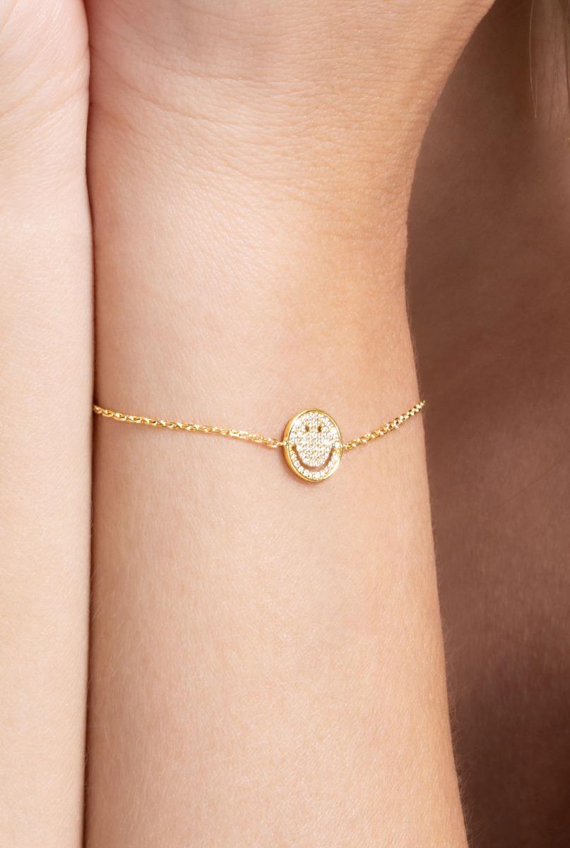 Yellow gold chain bracelet with diamond-paved smiley