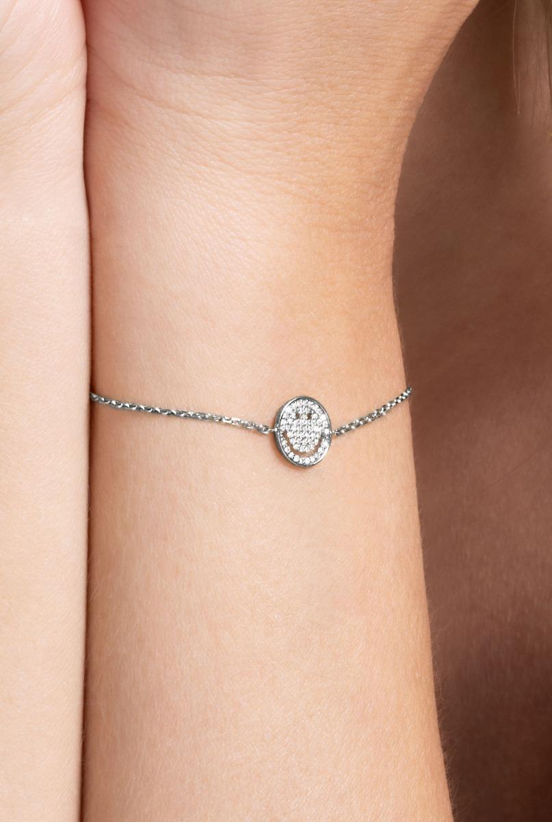 Black gold chain bracelet with diamond-paved smiley