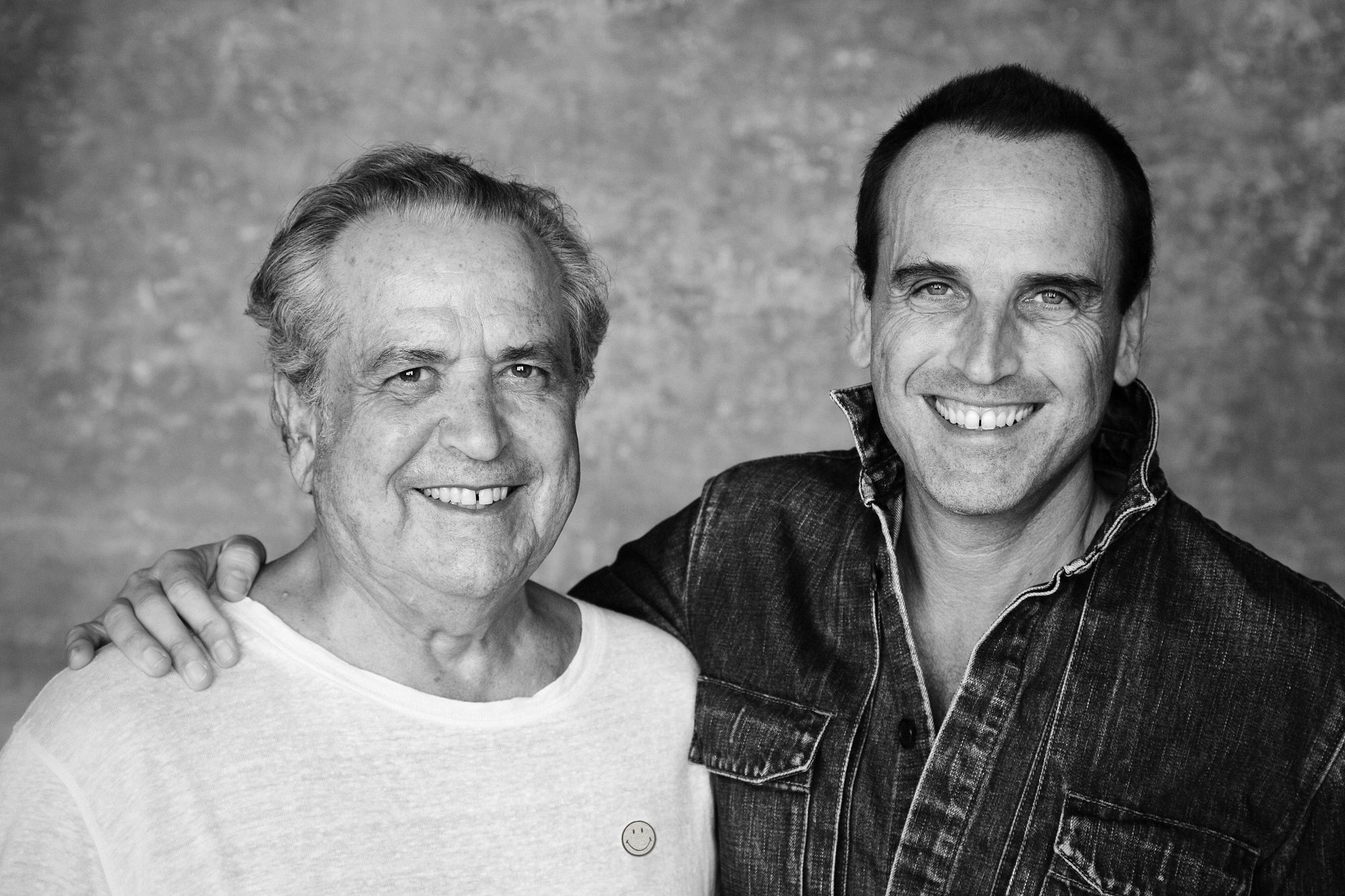 Franklin Loufrani (left) the President and Founder of The Smiley®Company with his son Nicolas Loufrani, CEO & Creative Director of The Smiley®Company