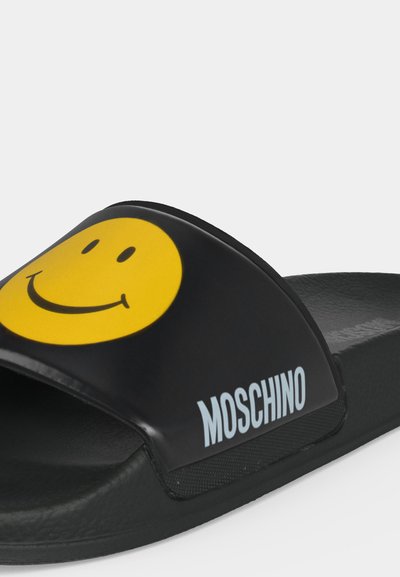 MOSCHINO SMILE - Mules - black/yellow